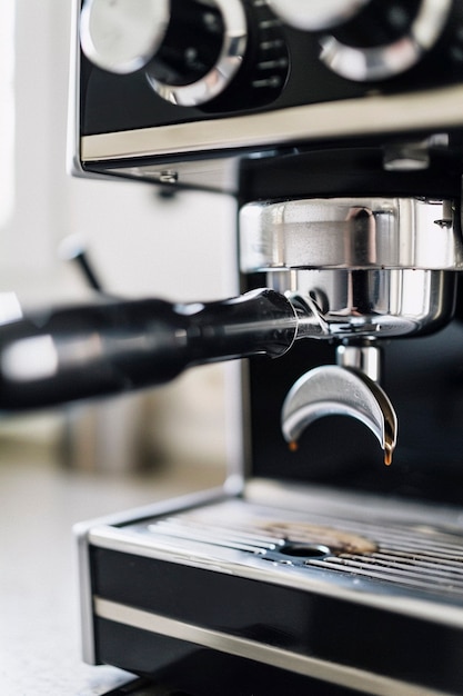 View of coffee machine making coffee at home