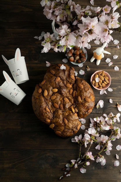 Free photo above view colomba with almonds and flowers