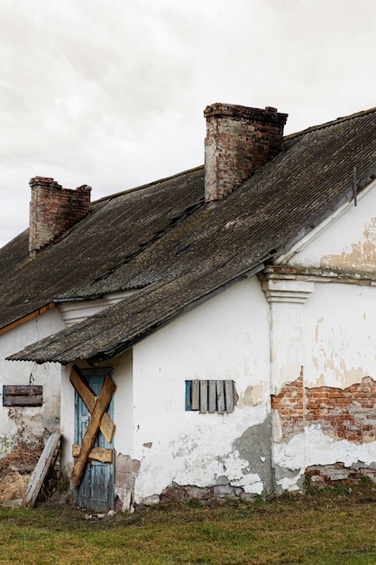 Free Photo view of deserted and decaying house in nature