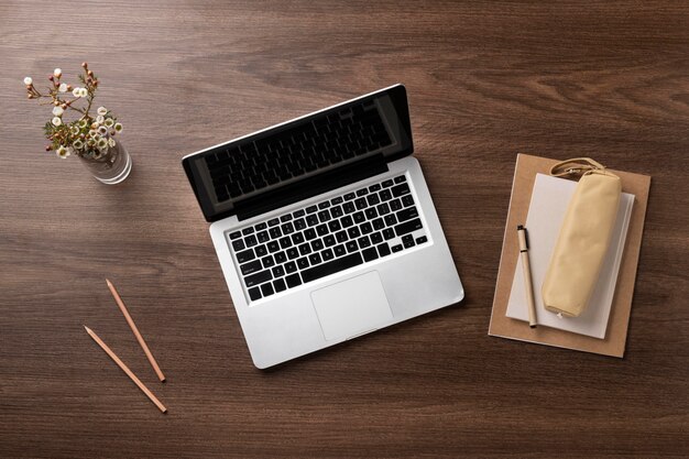 Above view desk arrangement with laptop