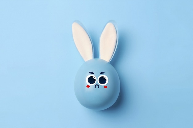 Free photo view of easter egg with cartoon face