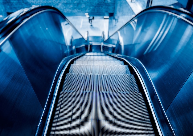 Free photo view of escalator in blue tone