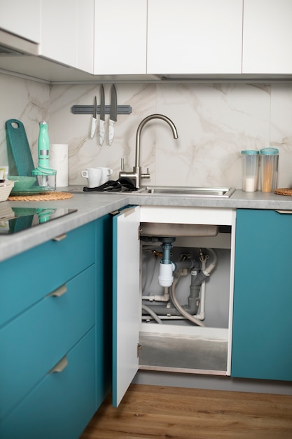 Free Photo view of exposed plumbing pipes in the kitchen