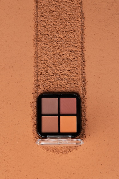 View of eyeshadow palette with cosmetic powder