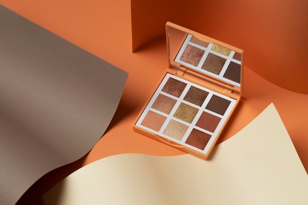 Free Photo view of eyeshadow palette with shades of cosmetic powder