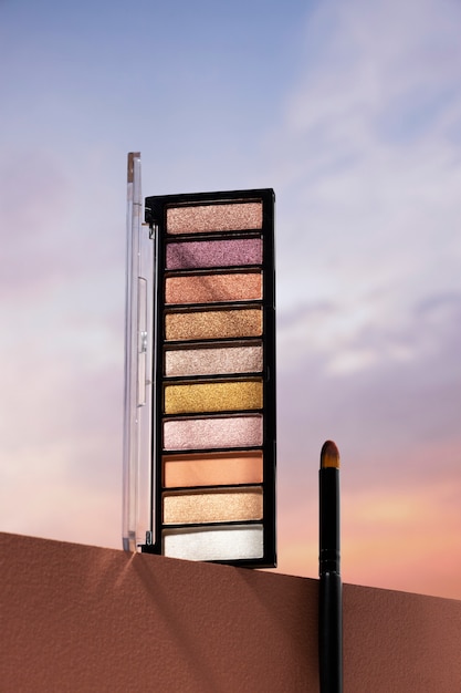 Free Photo view of eyeshadow palette with sky and clouds