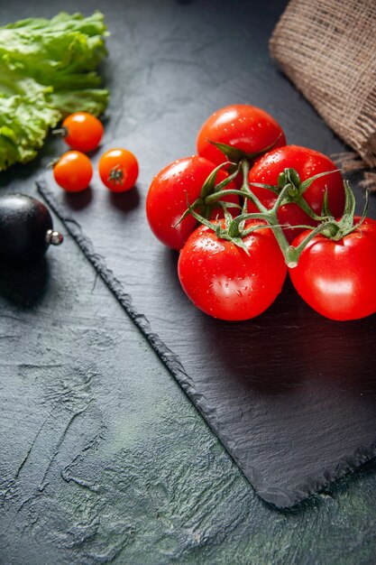 above view fresh red tomatoes on dark background