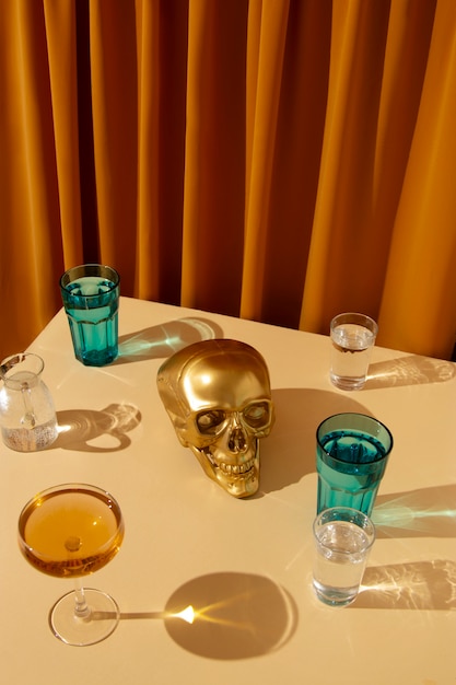 View of golden skull with alcoholic drink