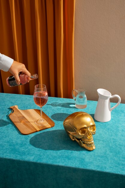 View of golden skull with alcoholic drink