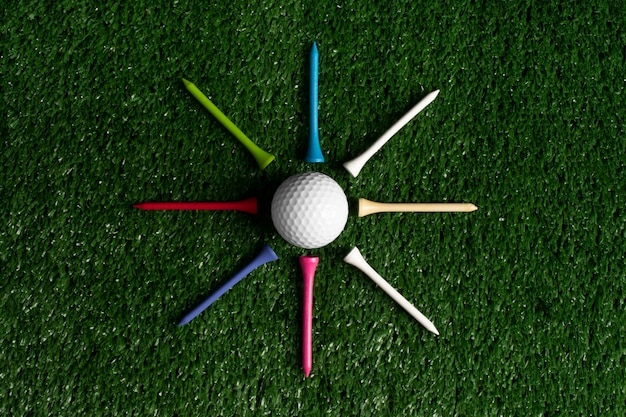 Free photo view of golf ball with tees