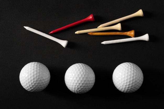 Free photo view of golf tees with balls