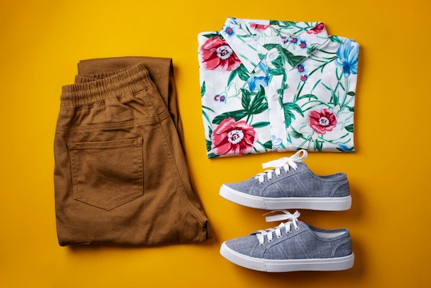 Free Photo view of hawaiian shirt with pants and sneakers