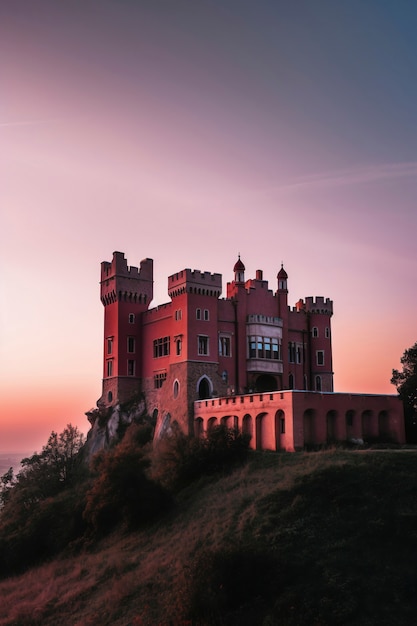 Free photo view of imposing castle with natural landscape