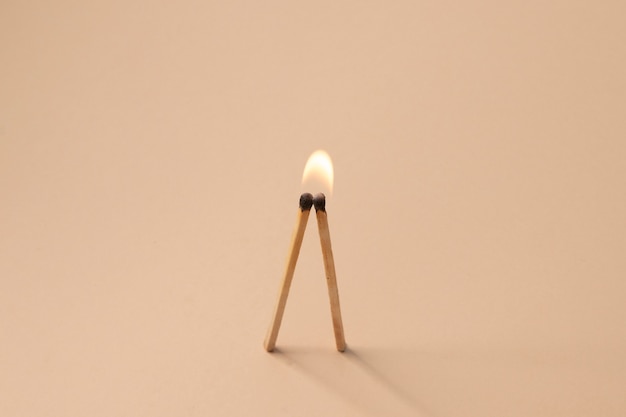 Free Photo view of lit wooden matchsticks