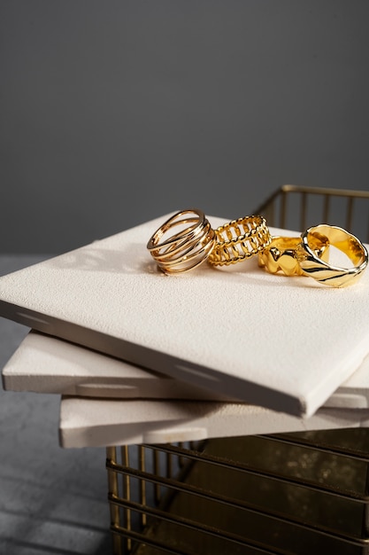 Free photo view of luxurious golden ring on felt jewelry display