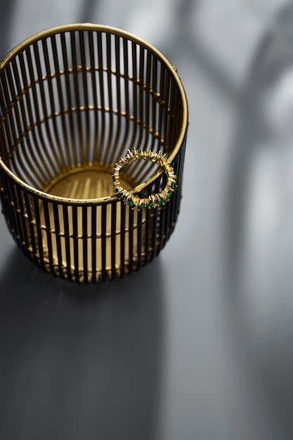 Free Photo view of luxurious golden ring with basket