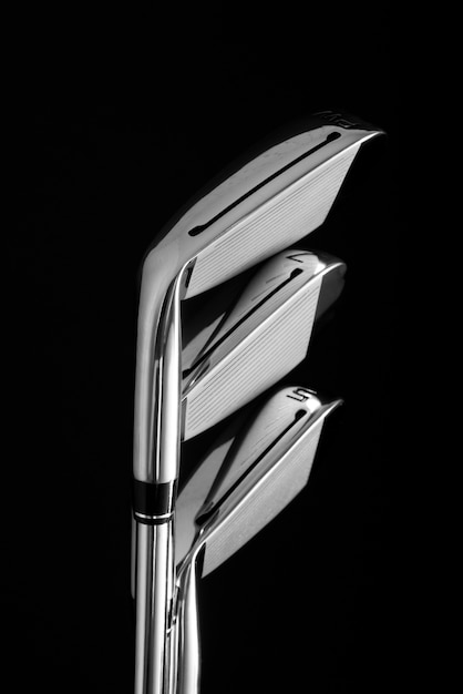 Free photo view of metallic golf clubs