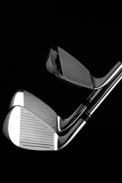 View of metallic golf clubs