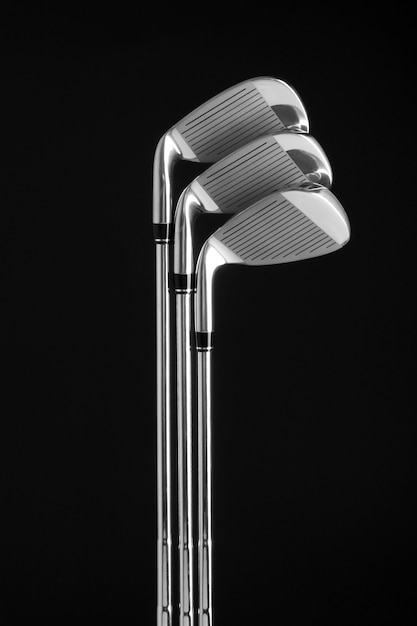 Free photo view of metallic golf clubs