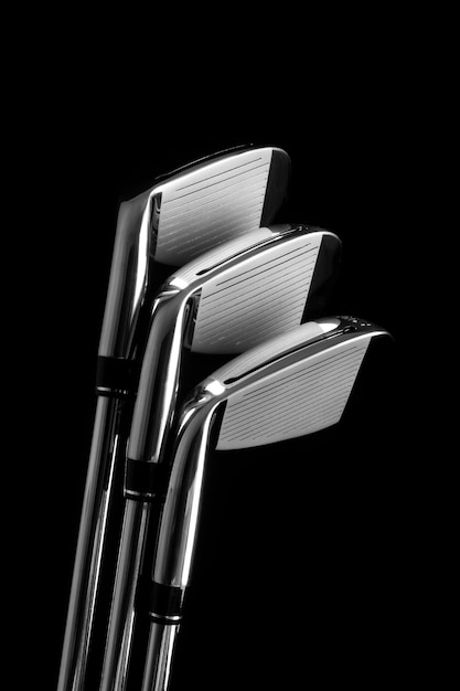 Free photo view of metallic golf clubs