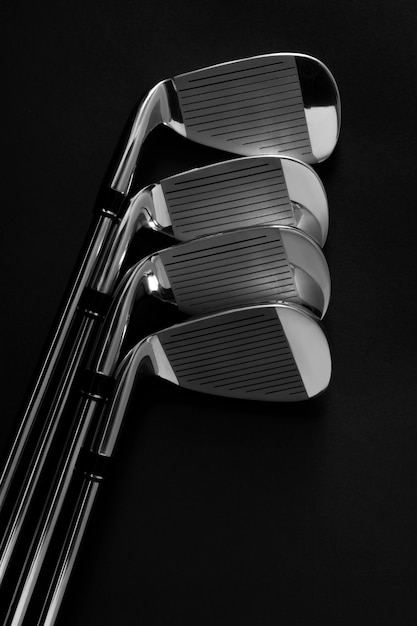 Free photo view of metallic golf clubs