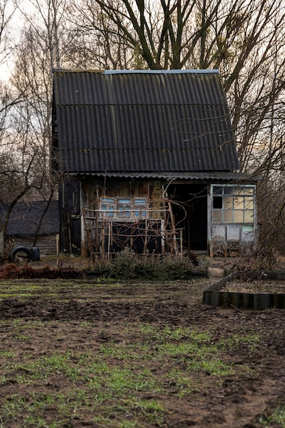 View of old and abandoned house in nature