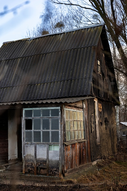 View of old and abandoned house in nature