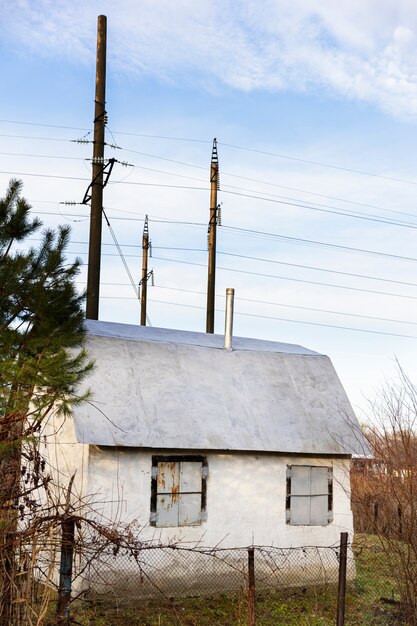 View of old and abandoned house in nature