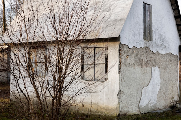 View of old and abandoned house in nature