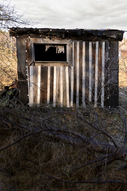 View of old and abandoned house in nature