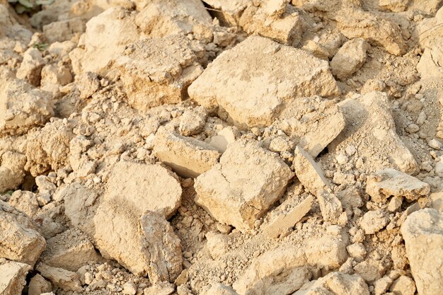 Above view of old destroyed beige stones.