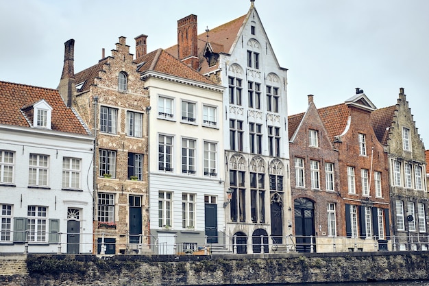 Free Photo view of an old town of bruges in belgium on a white sky