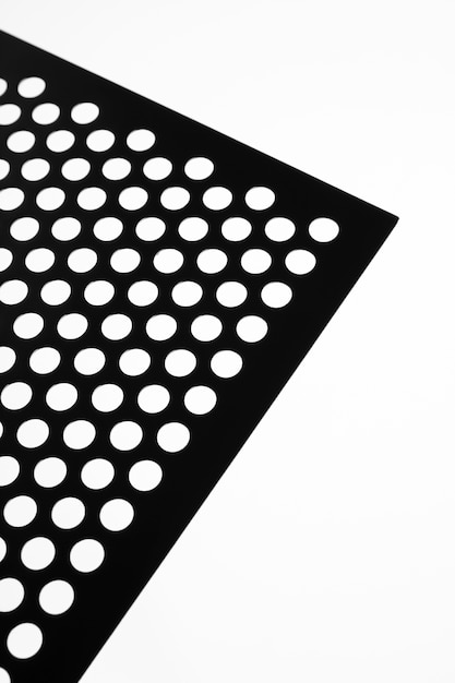 Free Photo view of perforated sheet of material with tiny holes