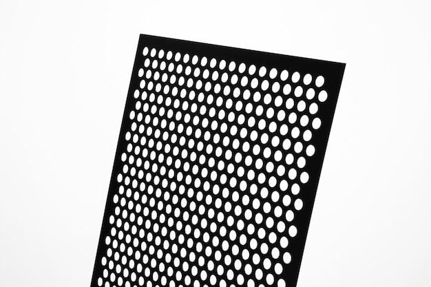 Free photo view of perforated sheet of material with tiny holes