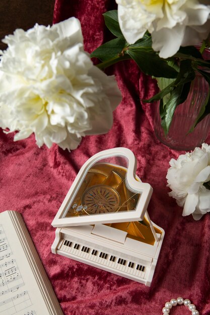 View of piano shaped music box with bohemian decor