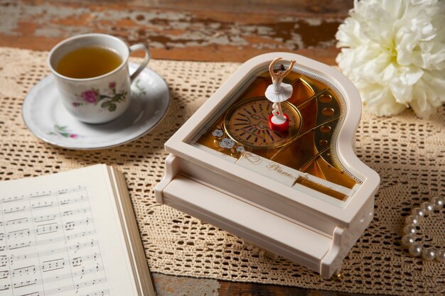 View of piano shaped music box with bohemian decor