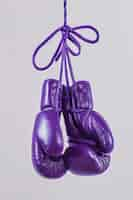 Free photo view of purple boxing gloves for women's day celebration