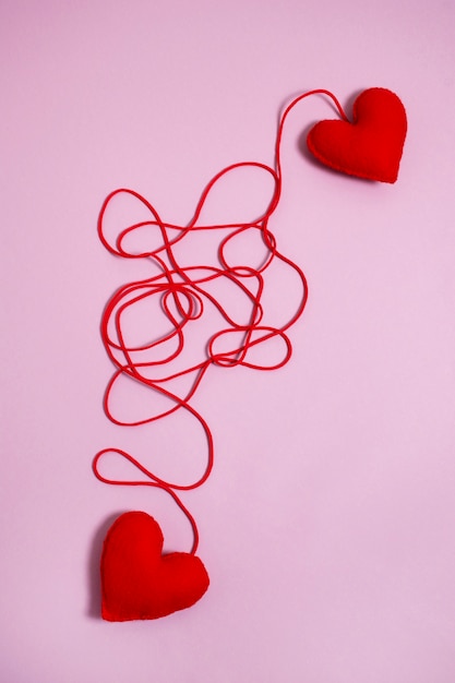 Free photo view of red thread with heart shape