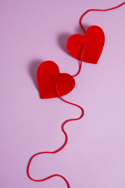 Free photo view of red thread with heart shape