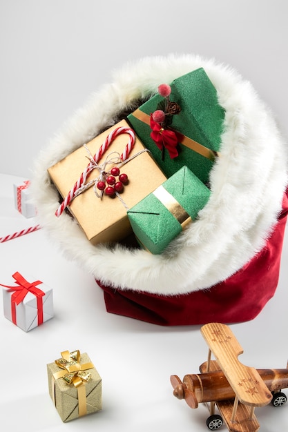 View of santa claus bag with presents and toys