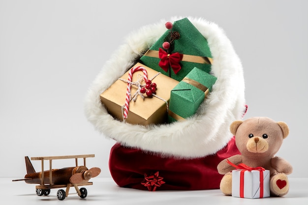 View of santa claus bag with presents and toys