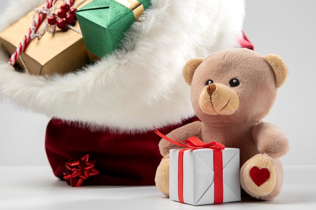 Free photo view of santa claus bag with presents and toys