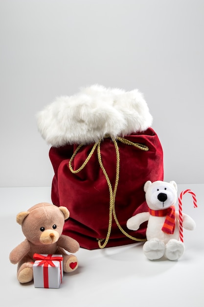 Free photo view of santa claus bag with presents and toys