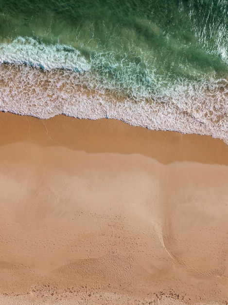 Free photo view of sea stream on sandy beach