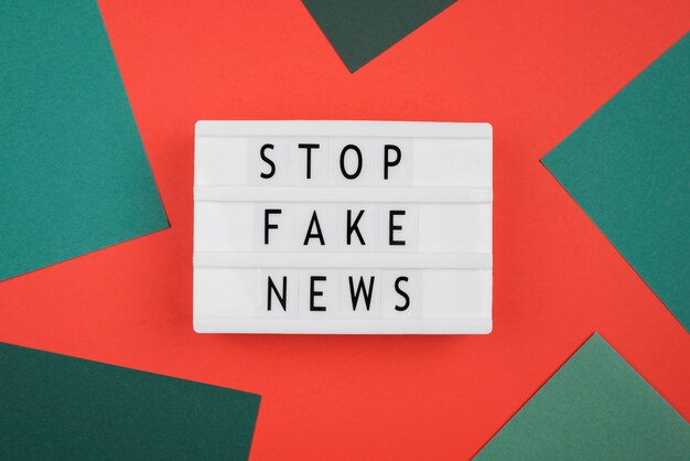 Above view stop fake news concept