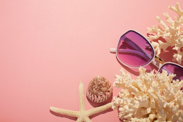 View of summer sunglasses with coral