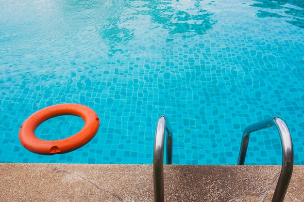 Free photo view of swimming pool with ladder and float