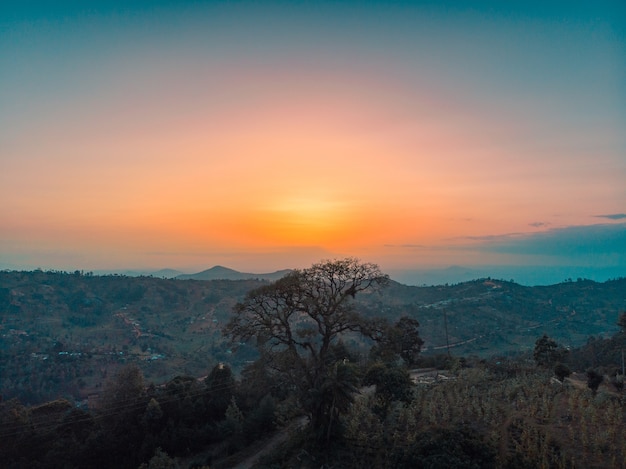 Free photo view of the tree covered hills with the sunset