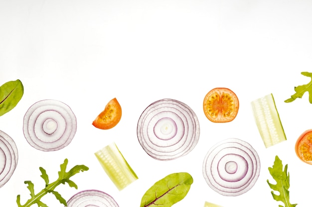 Free photo above view vegetable slices with copy space