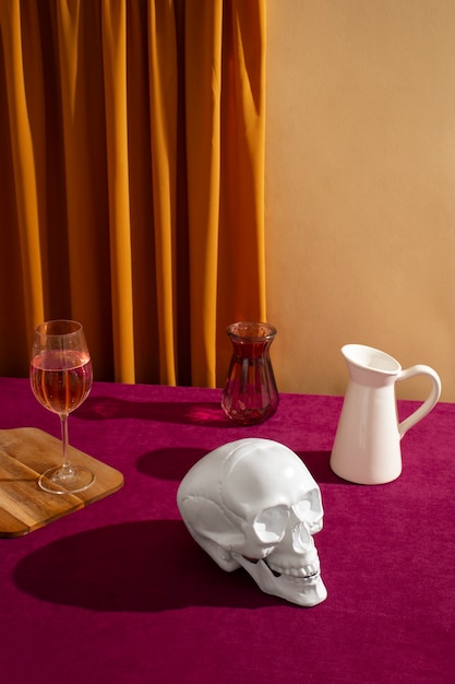 View of white skull with alcoholic drink